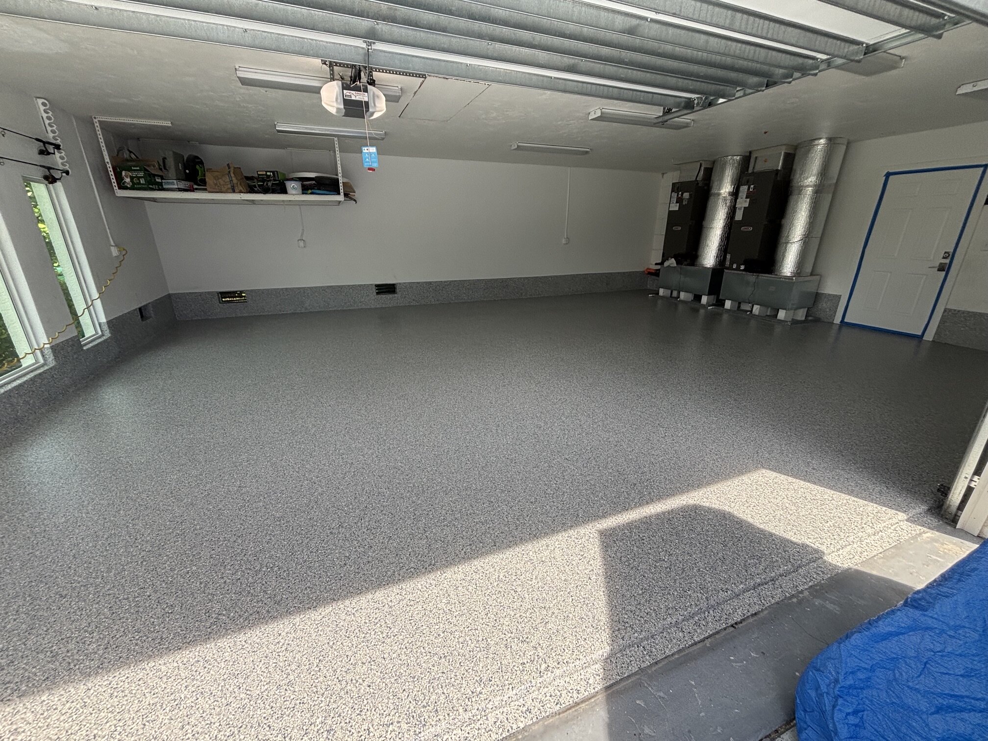Second view of the finished gray flake garage floor in Marco Island