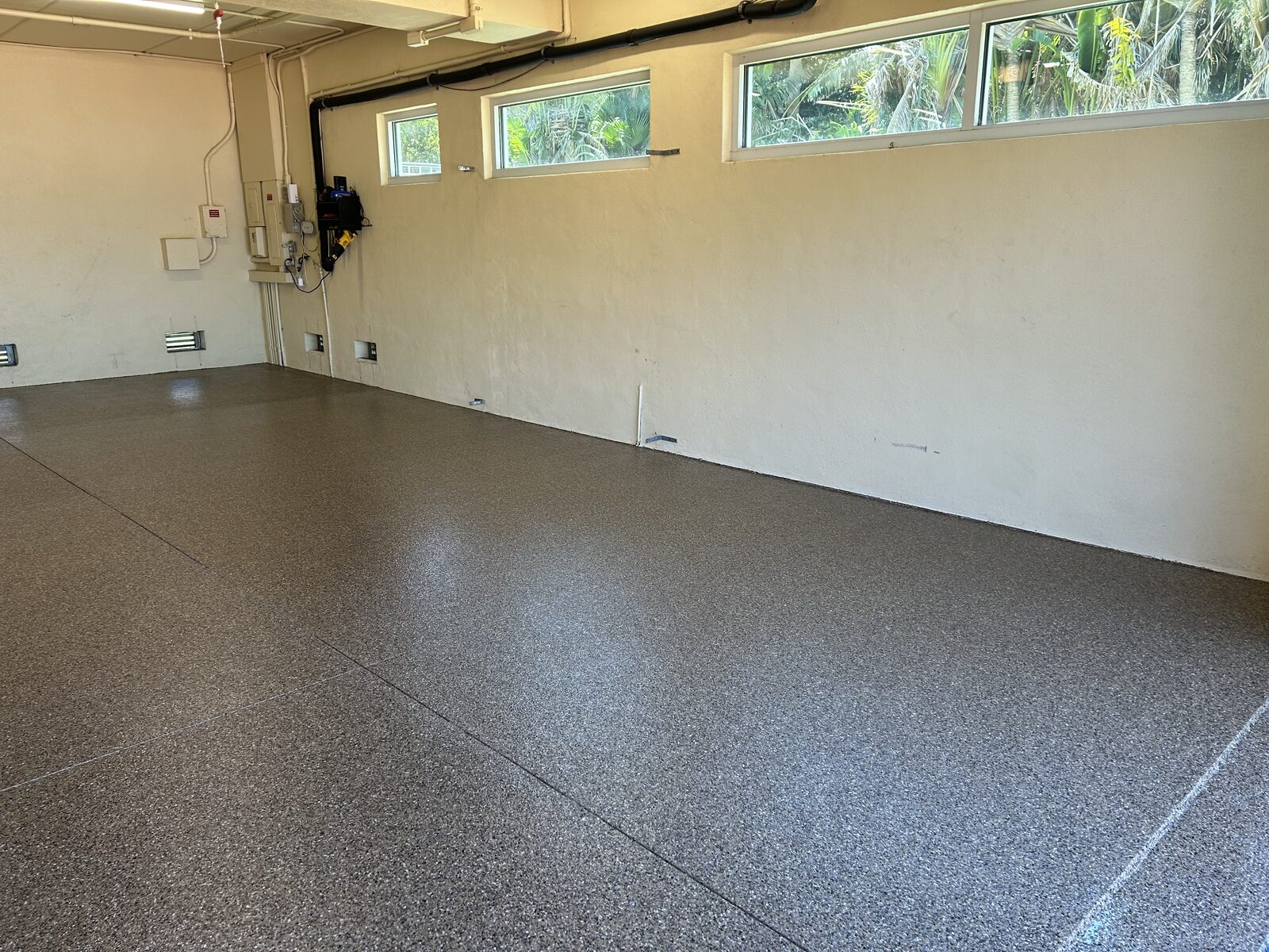 Finished decorative garage floor after concrete preparation