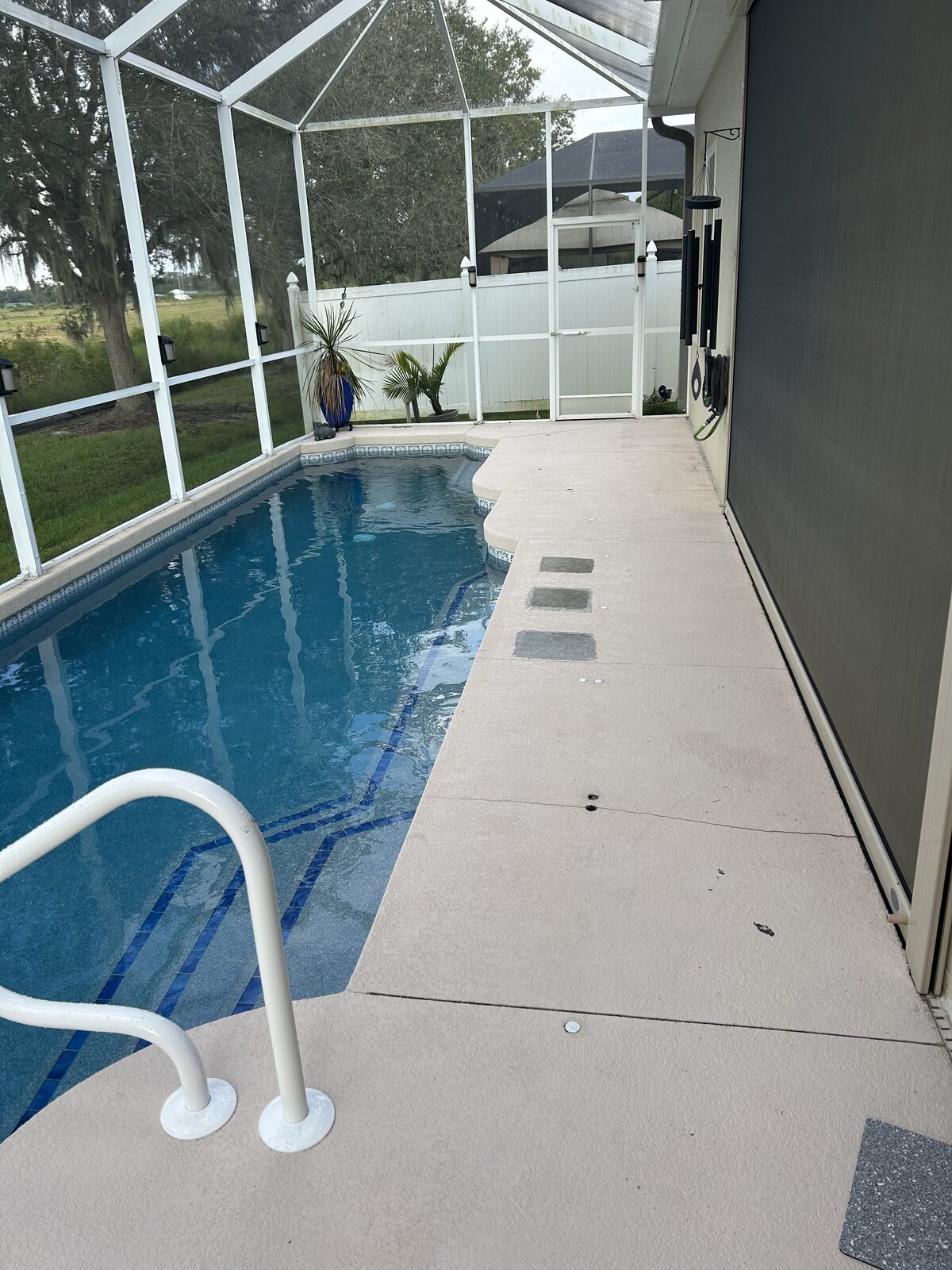 Pool deck concrete before surface preparation and coating