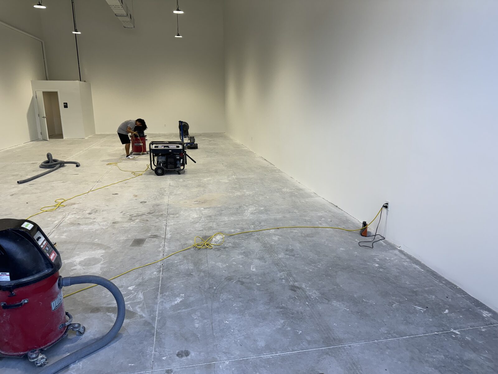 Large commercial or warehouse concrete floor during surface preparation