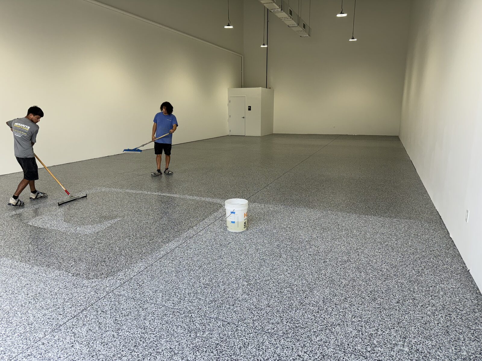 Commercial warehouse floor during coating installation