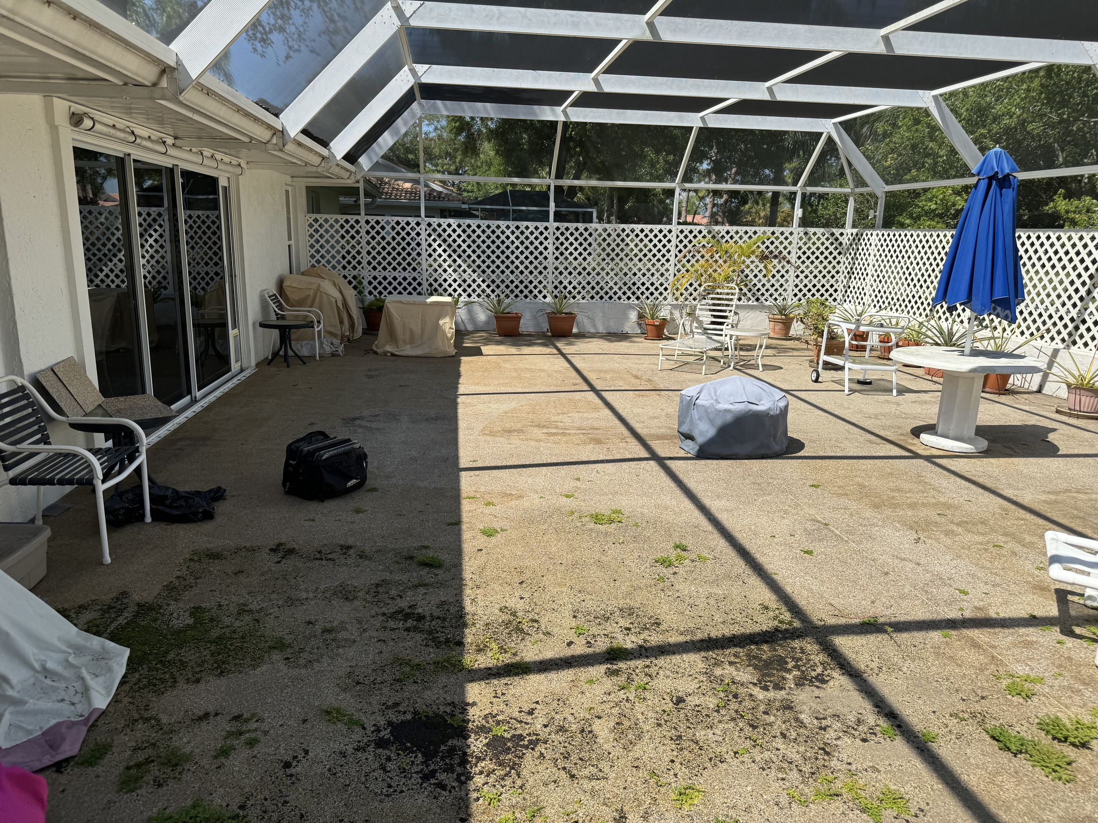 Covered patio and lanai concrete before surface preparation
