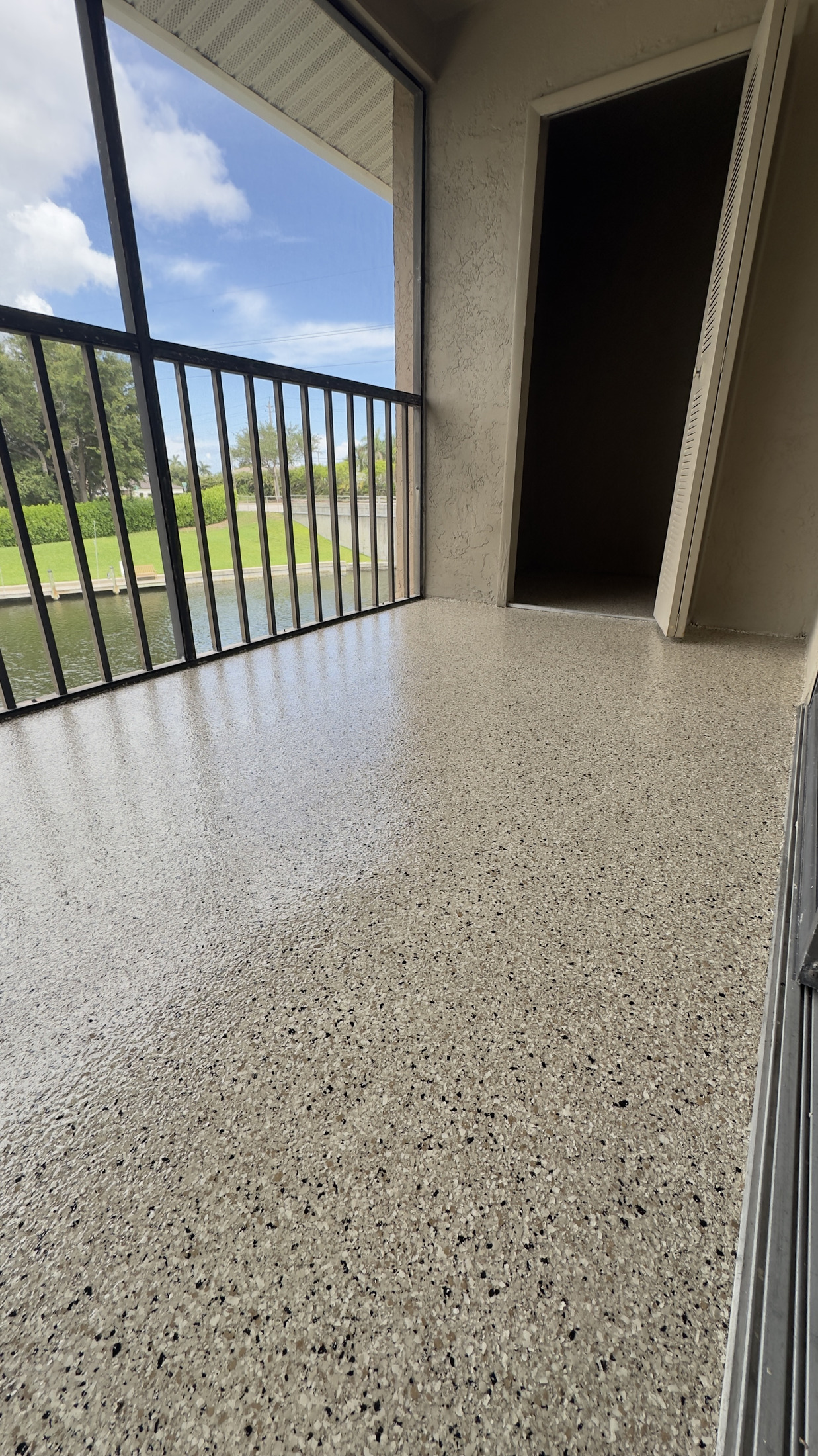 Vertical view of a finished covered lanai floor coating