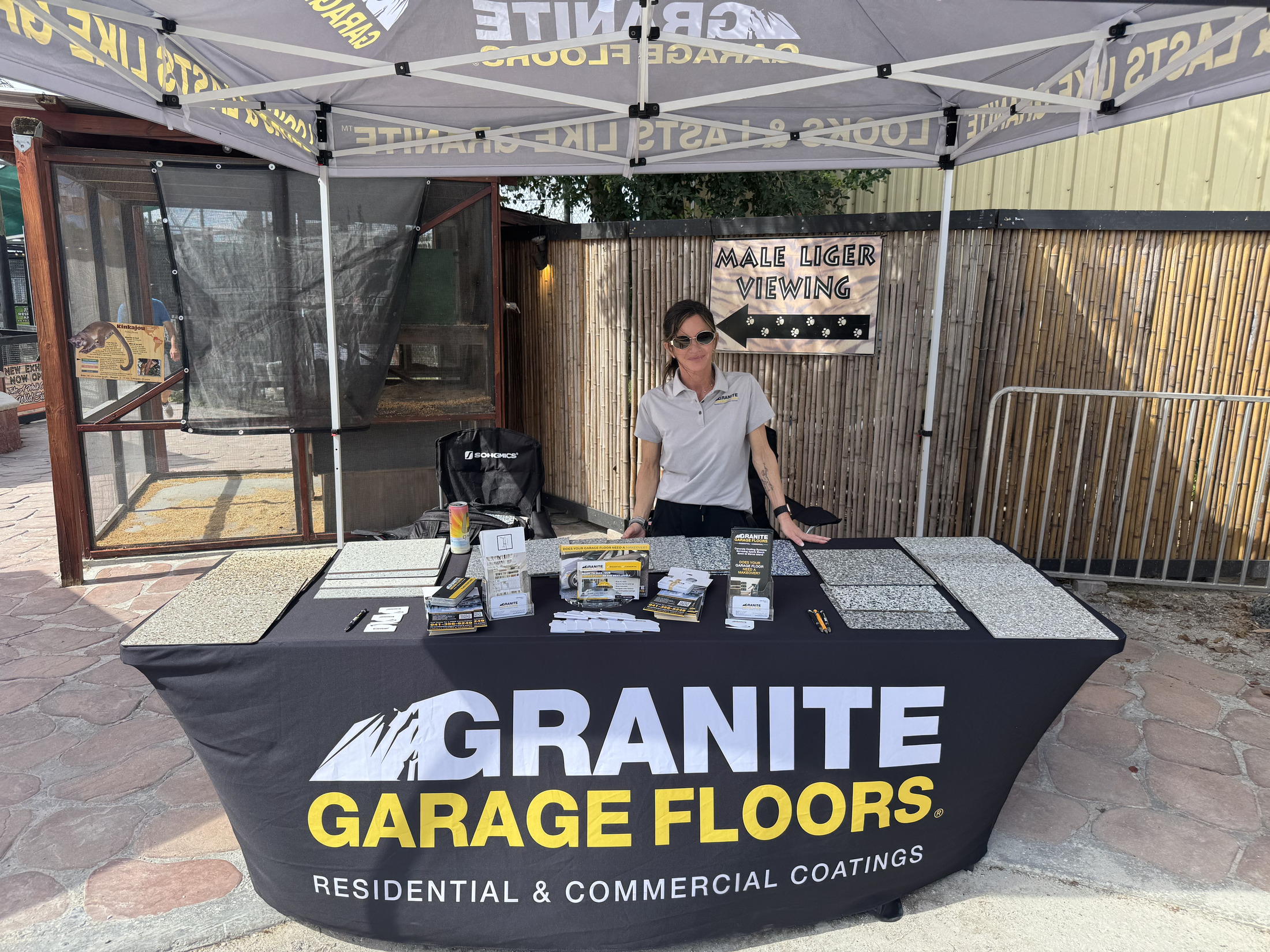 Granite Garage Floors branded booth at a Cars and Coffee community event