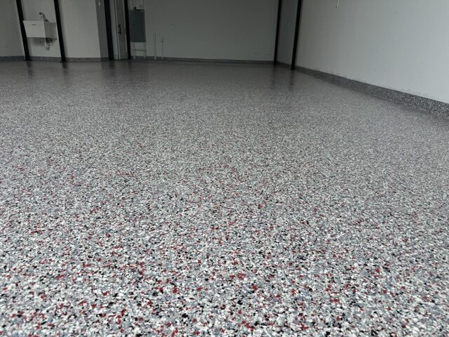 Wide finished coated floor in a large commercial or warehouse interior