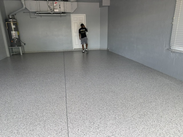Finished decorative concrete surface in a covered exterior space